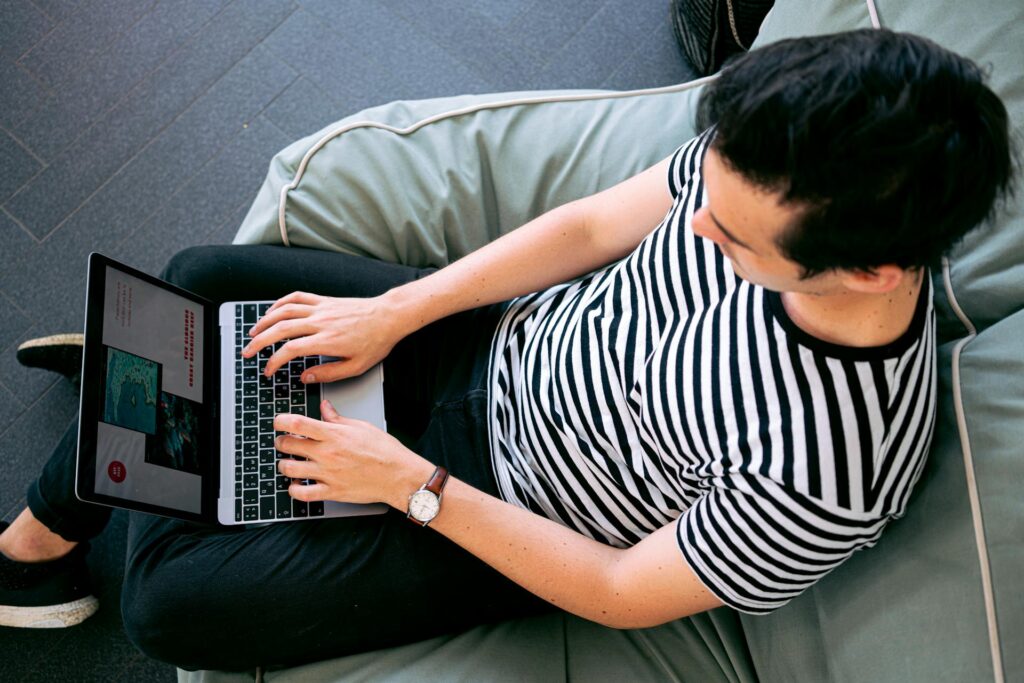 A man working remotely making money with a laptop